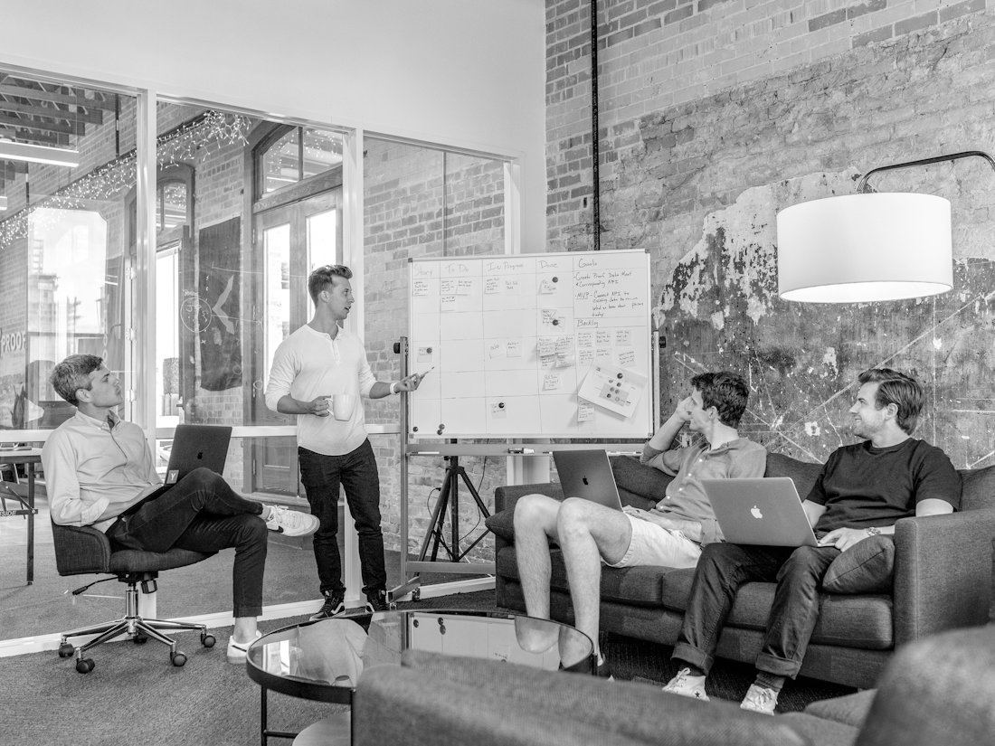 Team working on laptops during a planning session